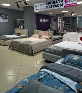 Фирменный магазин «КОРОНА», ул. Менделеева, 177, МЦ «Чайка», 4 этаж. 